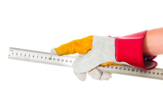 gloved hand with a ruler isolated on a white background