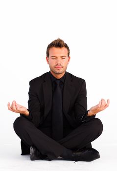 Young attractive man doing yoga exercises