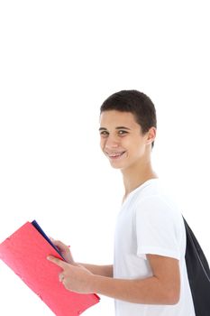 Confident cheerful teenage boy carrying college class files standing sideways isolated on white Confident cheerful teenage boy carrying college class files standing in profile isolated on white
