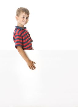 Boy holding a banner isolated on white background