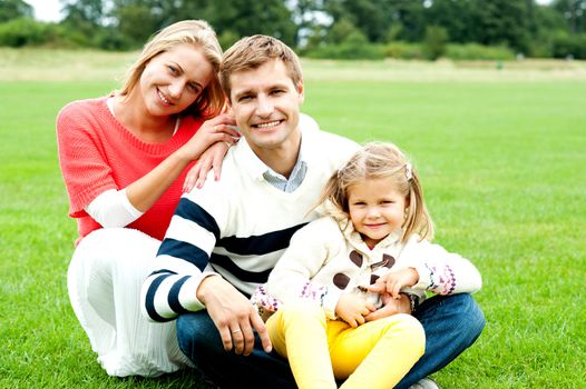 Outdoor happy caucasian family relaxing, spring day