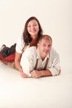 Bavarian couple in love in traditional costume