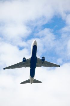 Airliner taking off against blue sky