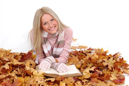 autumn woman read in studio on leaves