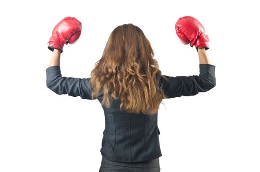 Young businesswoman in boxing concept