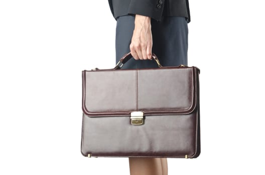 Close up of briefcase and businesswoman