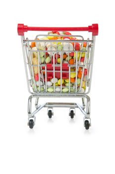 Shopping cart with many colourful pills