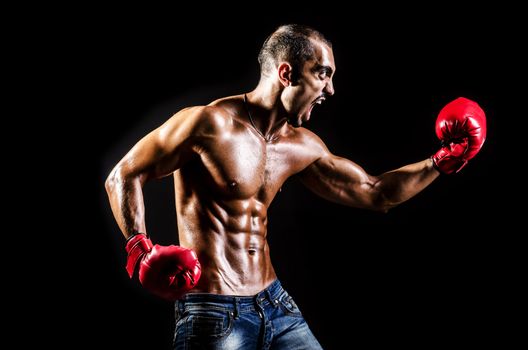 Young man with boxing gloves