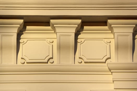 carved stone on  facade of an old house making a beautiful detail