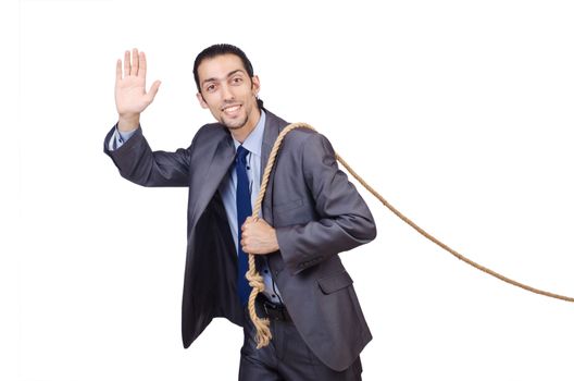 Businessman pulling rope on white