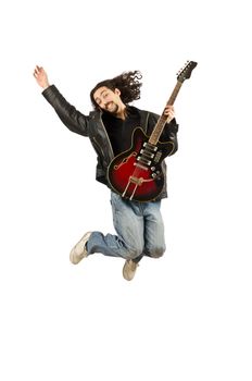 Young man playing guitar on white