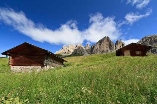 barns beneath Cir group, Gardena pass, Trentino Alto Adige, Italy