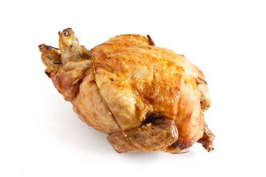 whole roasted chicken over white background