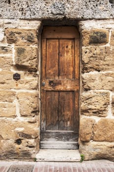 door of the old building in italian village of tuscany, italy