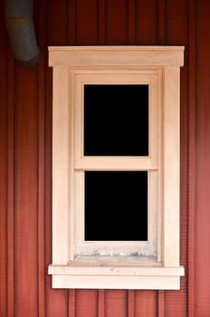 Home window against red wall