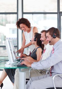 Joyful female manager with her sale representative team at work