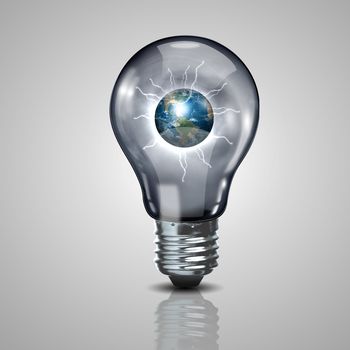 Electric light bulb and our planet inside it as symbol of green energy.Elements of this image furnished by NASA.