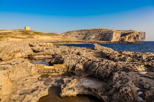 Rugged coast of the Maltese island Gozo, near Dwejra and the Fungus Rock