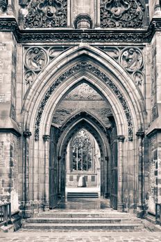 Old church door stone decorated arcs, detail view