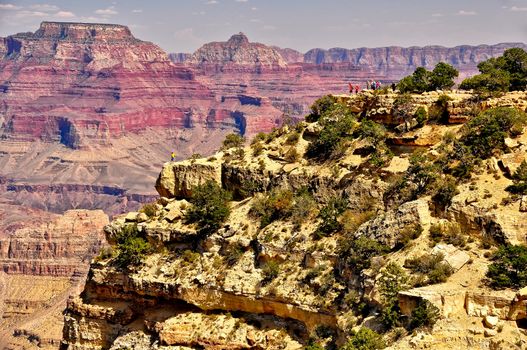 Grand canyon landscape view with people on the cliff, Arizona, USA