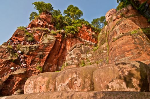 Leshan Buddha and people on stairs, China