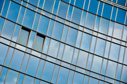 Office building glass wall with windows, no sky