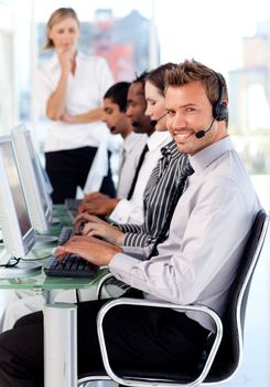 Glowing female manager leading her representative team in a office