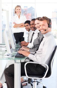 Beautiful manager leading her representative team in a office