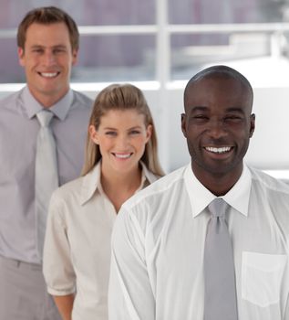 people talking together at work in a office