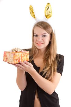 Portrait of a beautiful girl with rabbit ears with a gift in their hands