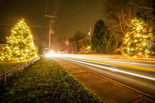 Traffic lights and light trails during busy christmas holiday season at mcadenville north carolina