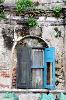 Old window on brick wall 