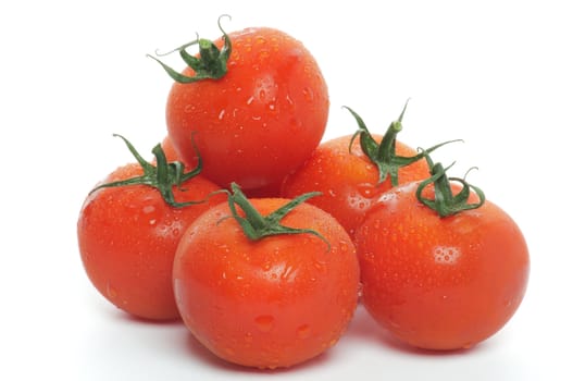 Heap of Fresh Tomatoes with Droplets isolated on white background