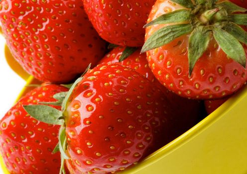 Perfect Raw Strawberries in Yellow Bucket closeup