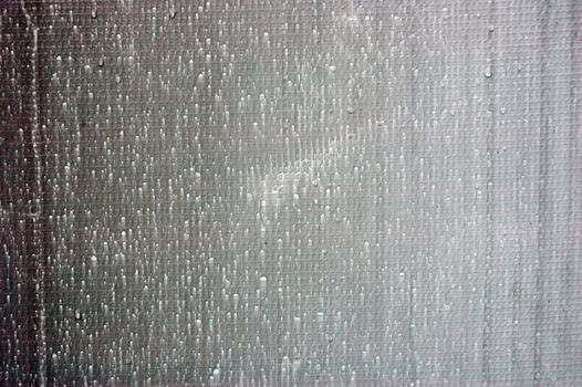 Drops of water on canvas