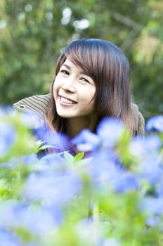 Portrait Of Asian Young Woman In garden in winter season