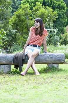 Portrait Of Asian Young Woman In garden in winter season