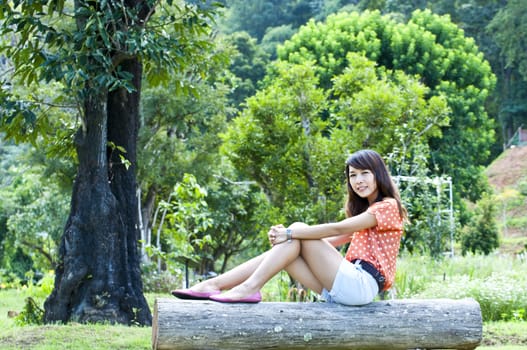 Portrait Of Asian Young Woman In garden in winter season