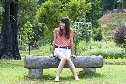 Portrait Of Asian Young Woman In garden in winter season