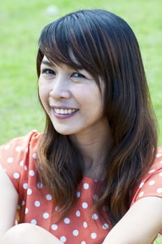 Portrait Of Asian Young Woman In garden in winter season