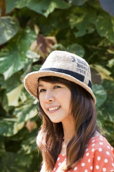 Portrait Of Asian Young Woman In garden in winter season