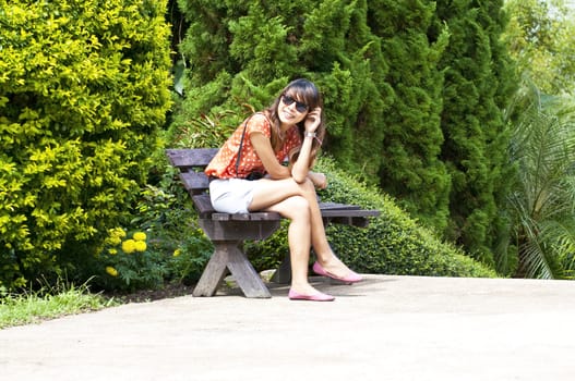 Portrait Of Asian Young Woman In garden in winter season