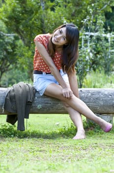 Portrait Of Asian Young Woman In garden in winter season