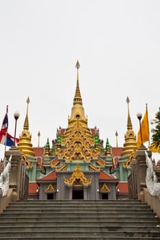 Thai temple and white cloudy sky