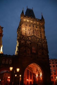 Classical gothic architecture. Night urban scene with ancient tower. Prague,Czech Republic