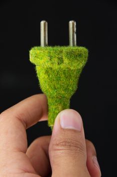 abstract image of green electric plug , save energy concept