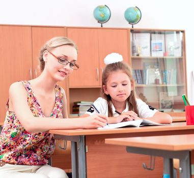 teachers are engaged with students, sitting next lesson explains