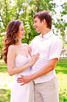 couple hugging in the park, have a good time together