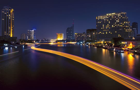 The light from the tallest building in the city and the river. Beautiful views of Bangkok Thailand.