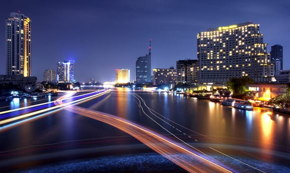 The light from the tallest building in the city and the river. Beautiful views of Bangkok Thailand.